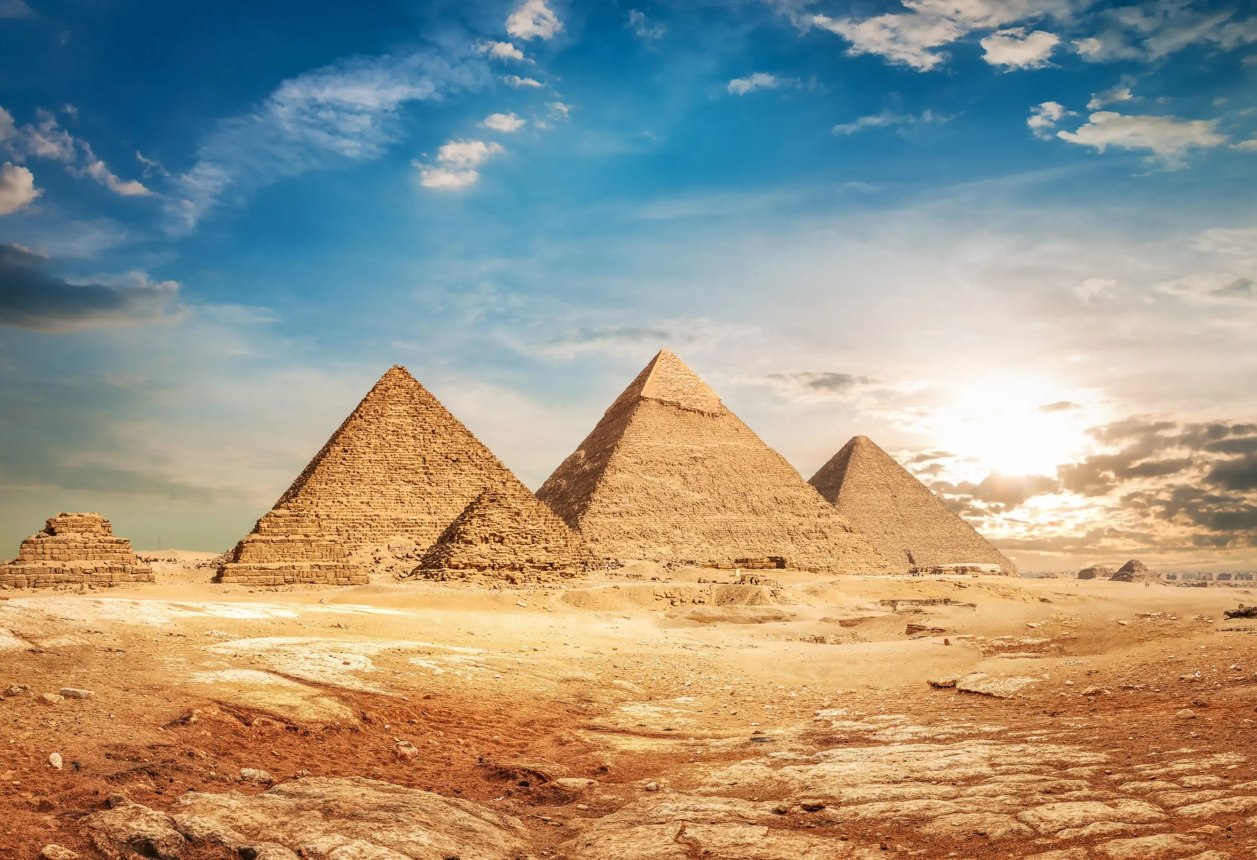 Great Pyramids of Giza and Sphinx rising from desert sands