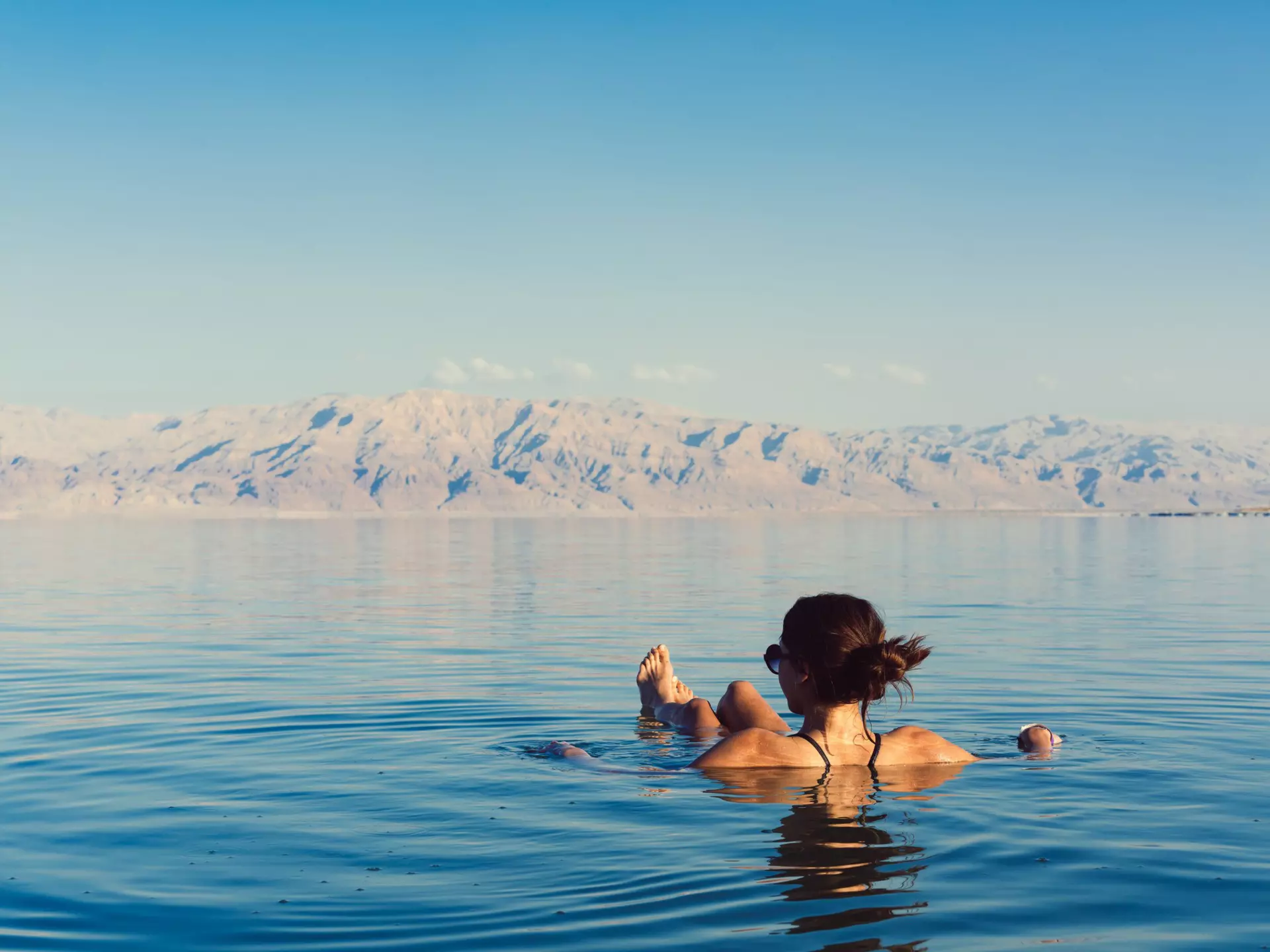 Floating weightlessly in the mineral-rich waters of the Dead Sea