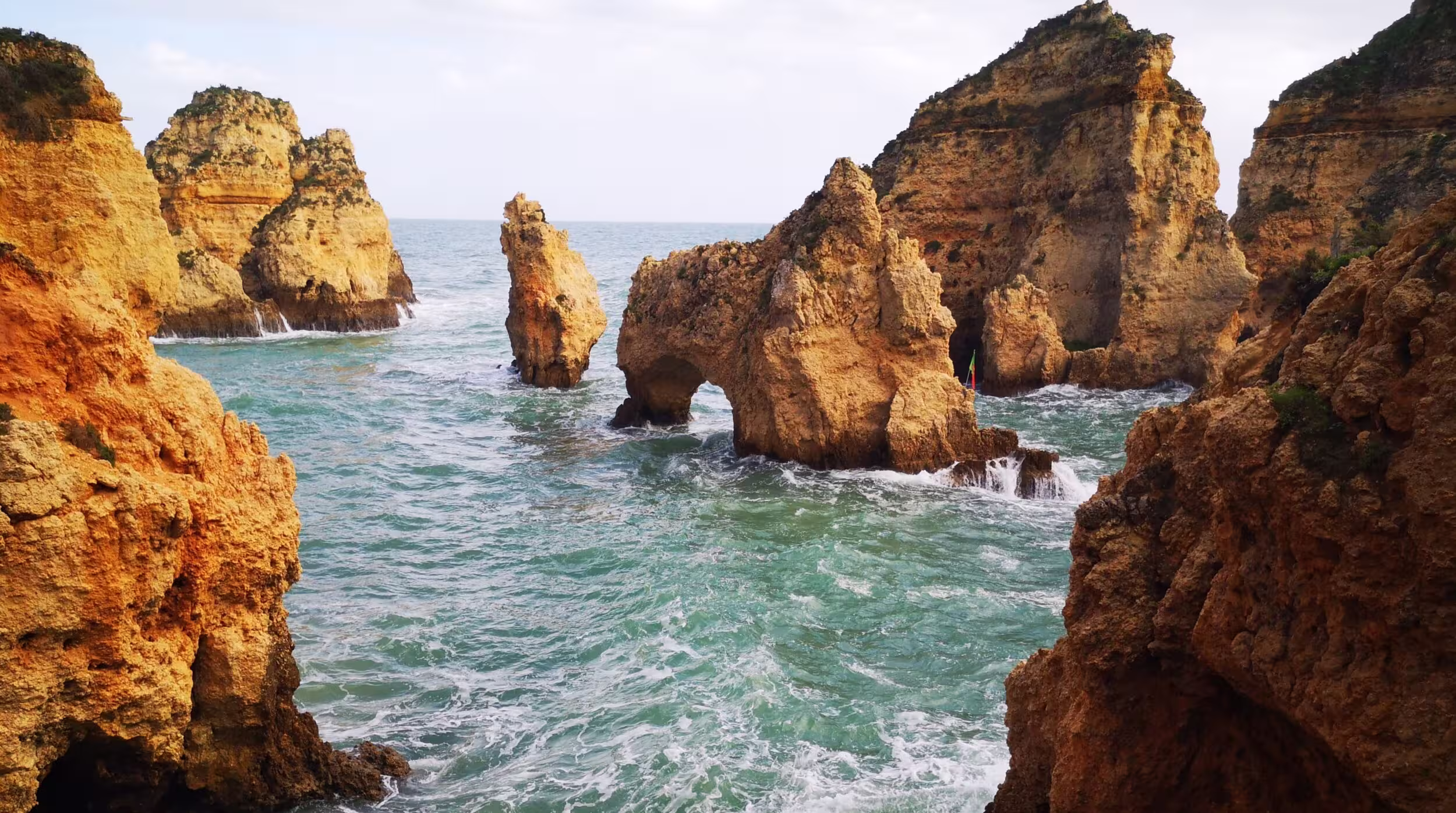 Golden sea arches and limestone cliffs of Ponta da Piedade
